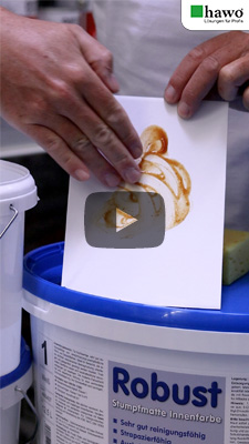 Titelbild zum YouTube-Erklär-Video von hawo Robust - Mit Ketchup verschmierte Fläche wird abgewischt